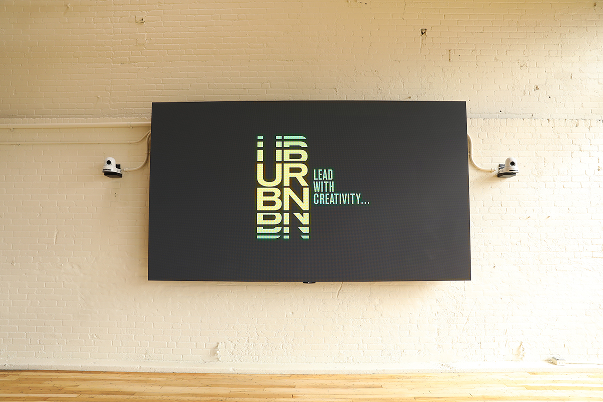 Digital display showing URBN logo