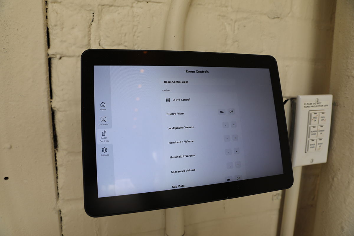 Tablet showing Q-SYS room controls