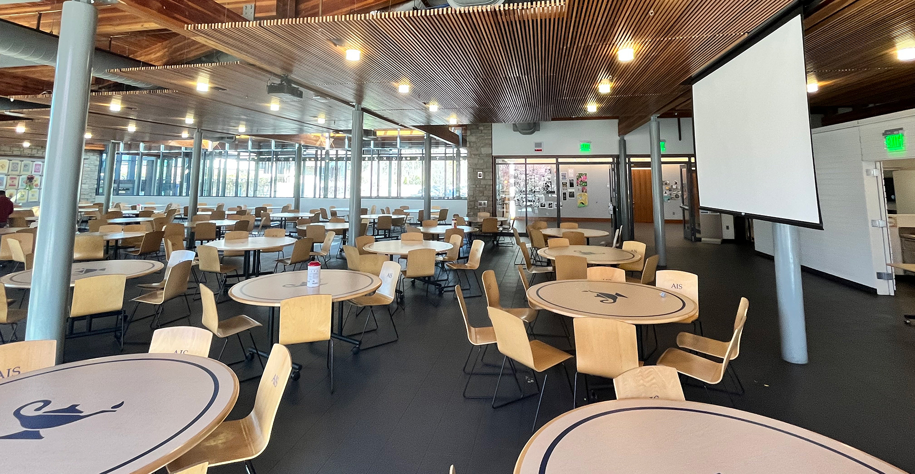 Agnes Irwin School dining hall with projector screen lowered