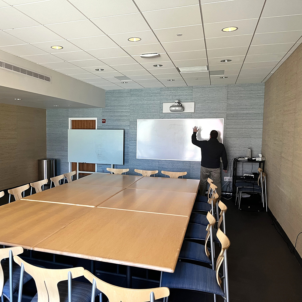 Agnes Irwin School classroom with whiteboard and mounted projector along back wall